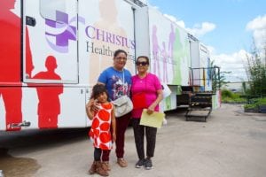 Josafina Juarez with her mother and daughter after getting medical advice from CHRISTUS Certified Medical Assistants near the Annam Community Center