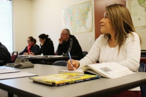 Elive Campos follows along during one of her courses at the CHRISTUS Learning Center